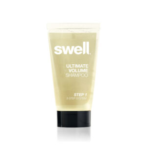 A 50ml bottle of Swell volume shampoo on a white background
