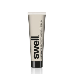 A small bottle of travel size Swell hair serum on a white background