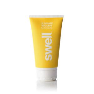 A travel-size bottle of Swell hair masque on a white background